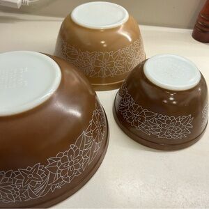 a set of vintage Pyrex Woodland nesting mixing bowls